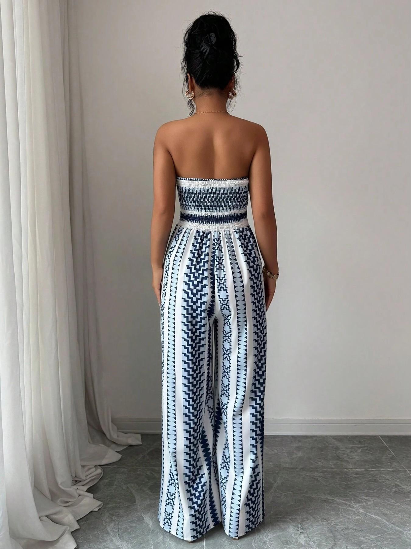 👗 47% OFF NOW! 💥 Geometric Jumpsuit with Halter Neckline & Side Slit – Unique print & elastic back – Versatile, perfect for summer parties or resort wear ✨
