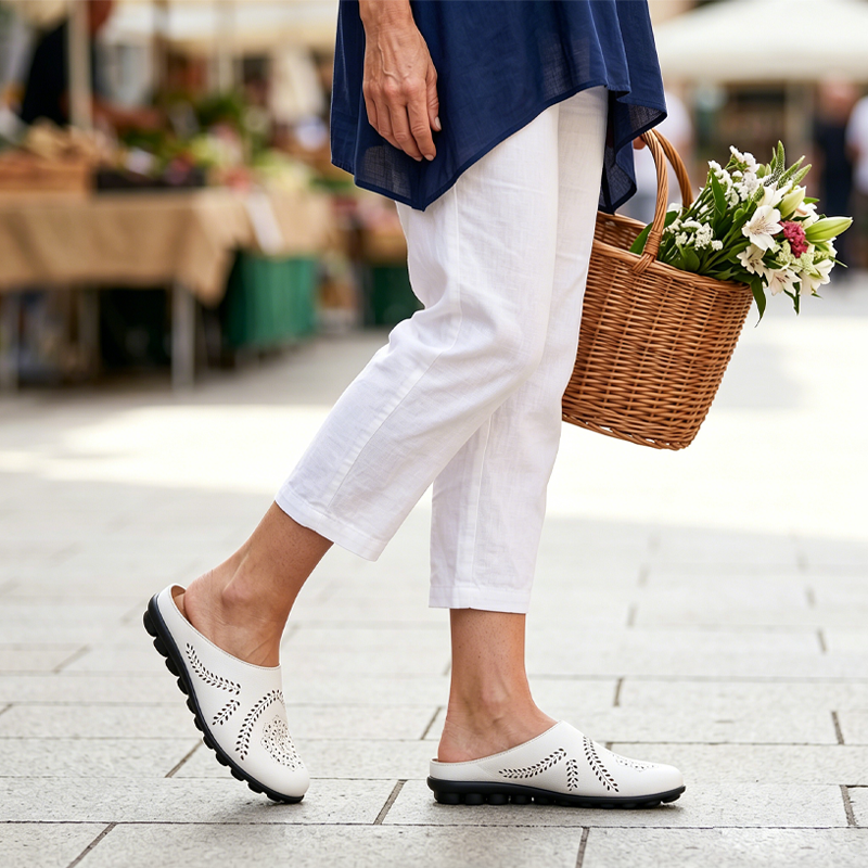 Loose-fitting slippers with a floral cutout, suitable for all foot types
