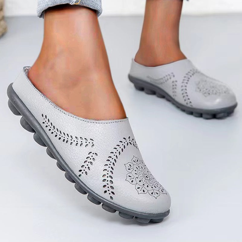 Loose-fitting slippers with a floral cutout, suitable for all foot types