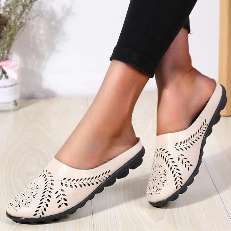 Loose-fitting slippers with a floral cutout, suitable for all foot types