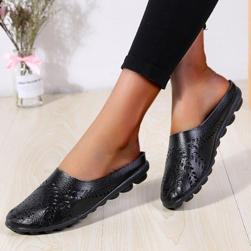 Loose-fitting slippers with a floral cutout, suitable for all foot types