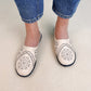 Loose-fitting slippers with a floral cutout, suitable for all foot types